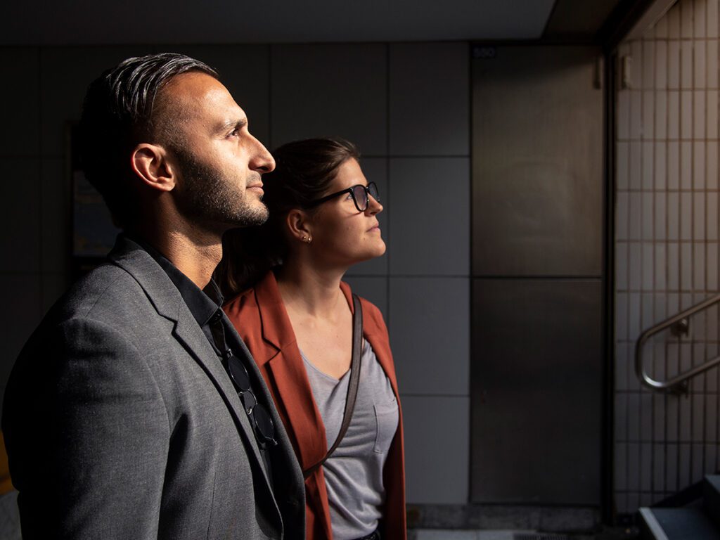 Man and woman standing by steps What is an Intervention: Confronting an Addicted Loved One