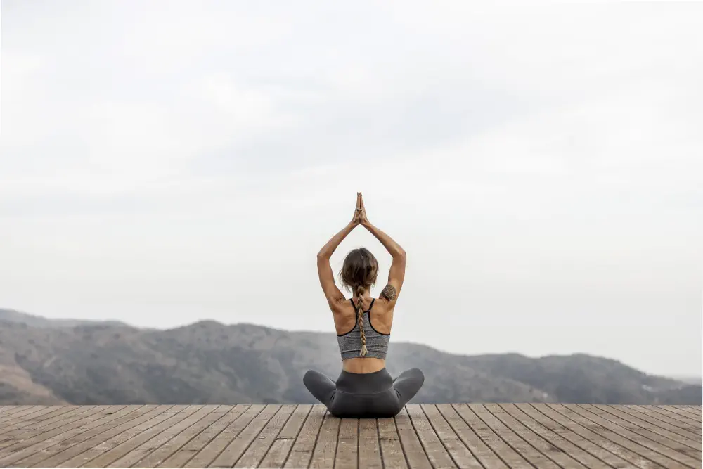 back-view-woman-doing-yoga-outdoors How to Detox from Weed: A Practical Guide