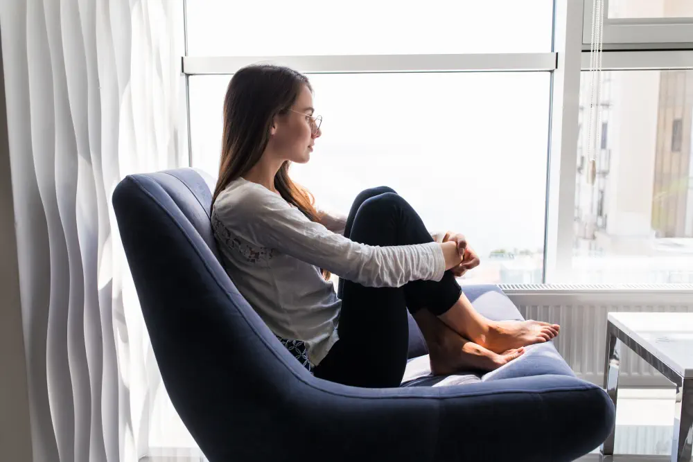 depression-woman-sit-chair-home What Is the Most Addictive Drug?