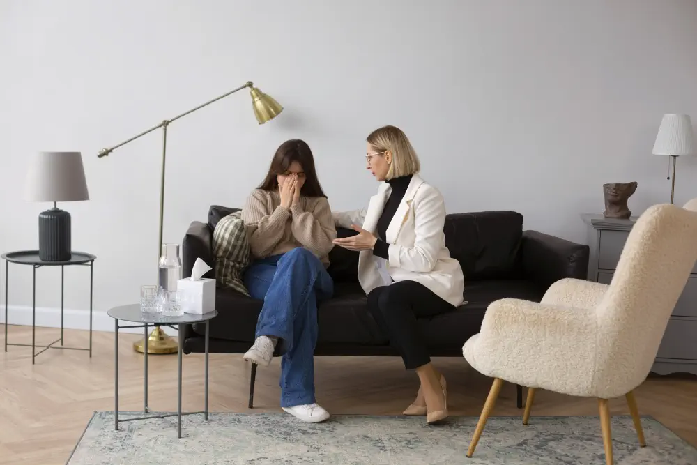 full-shot-young-woman-undergoing-therapy What to Avoid When Taking Naltrexone Treatment