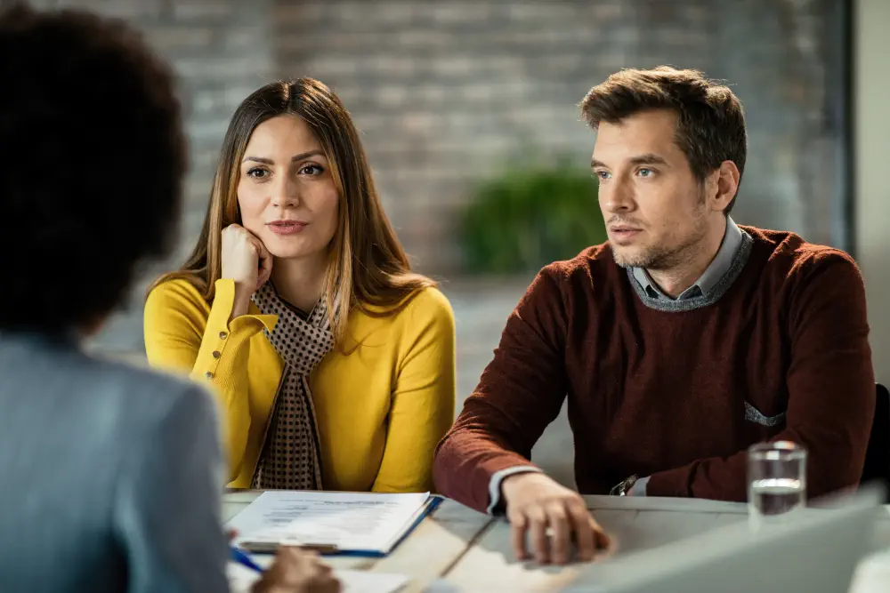 mid-adult-couple-having-business-meeting-with-insurance-agent-talking-about-their-savings-plan How Addictive is Cocaine?
