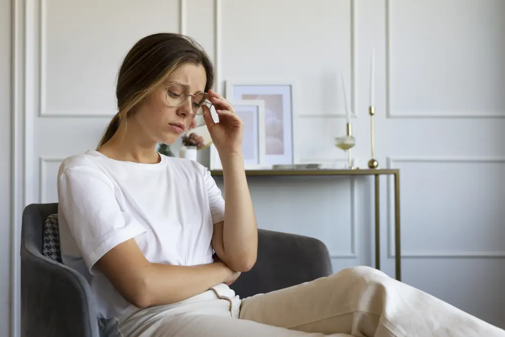 side-view-anxious-woman-sitting-chair What Are the Common Crack Withdrawal Symptoms to Watch Out For?
