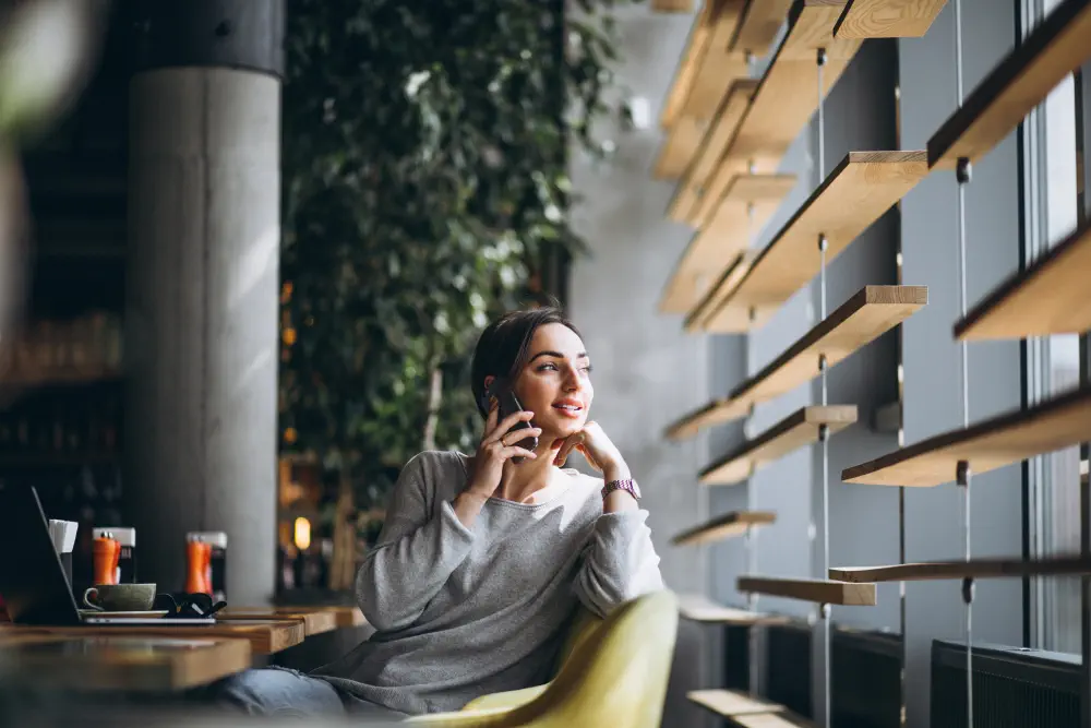 woman-sitting-cafe-drinking-coffee-working-computer Effective Interventions for Drug and Alcohol Abuse Recovery