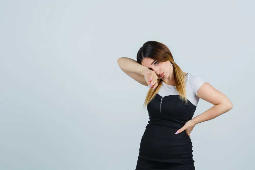 young-woman-leaning-head-elbow-looking-exhausted How to Detox from Weed: A Practical Guide