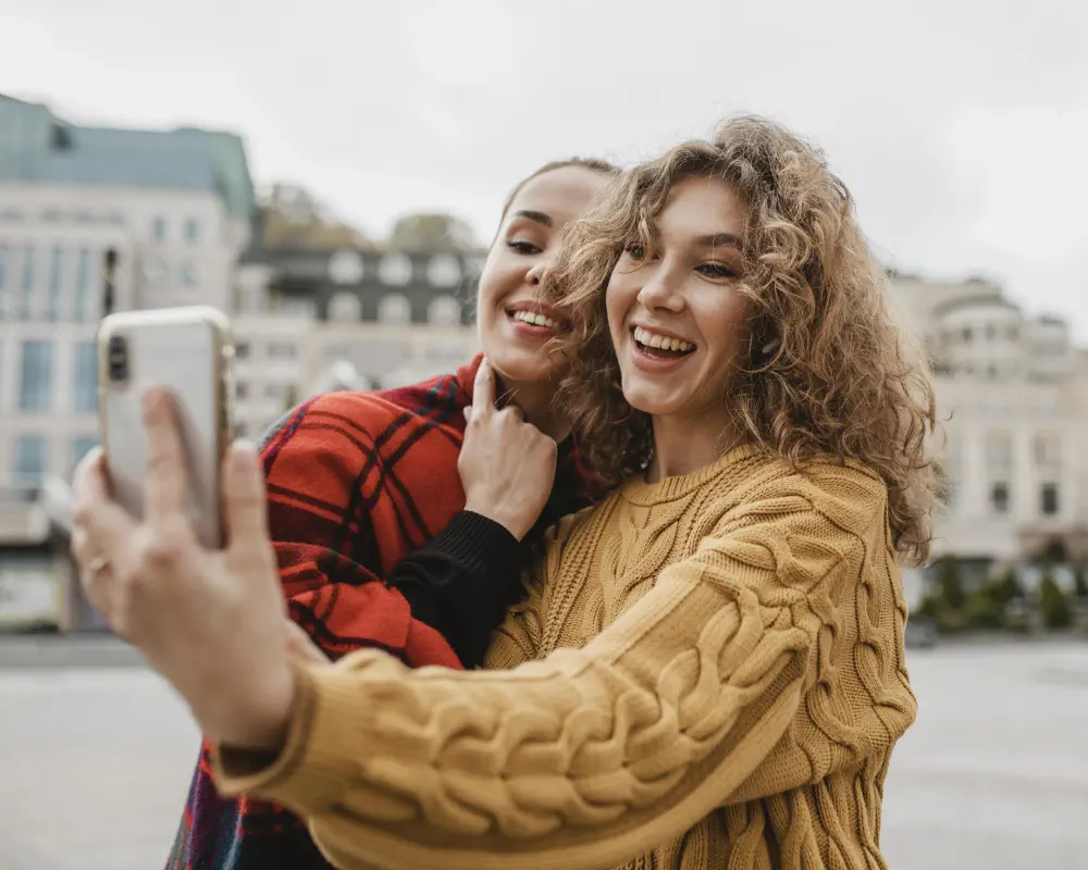 friends-taking-selfie-together-outdoors How to Help Someone with a Drinking Problem: A Guide