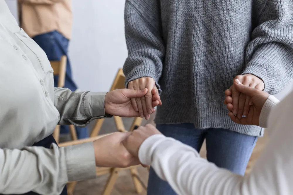 people-holding-hands-group-therapy-session How to Quit Drinking Alcohol: Effective Ways to Help Someone Stop