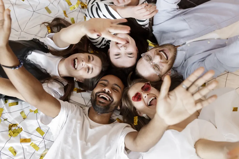 top-view-happy-people-laying-together How to Help Someone with a Drinking Problem: A Guide