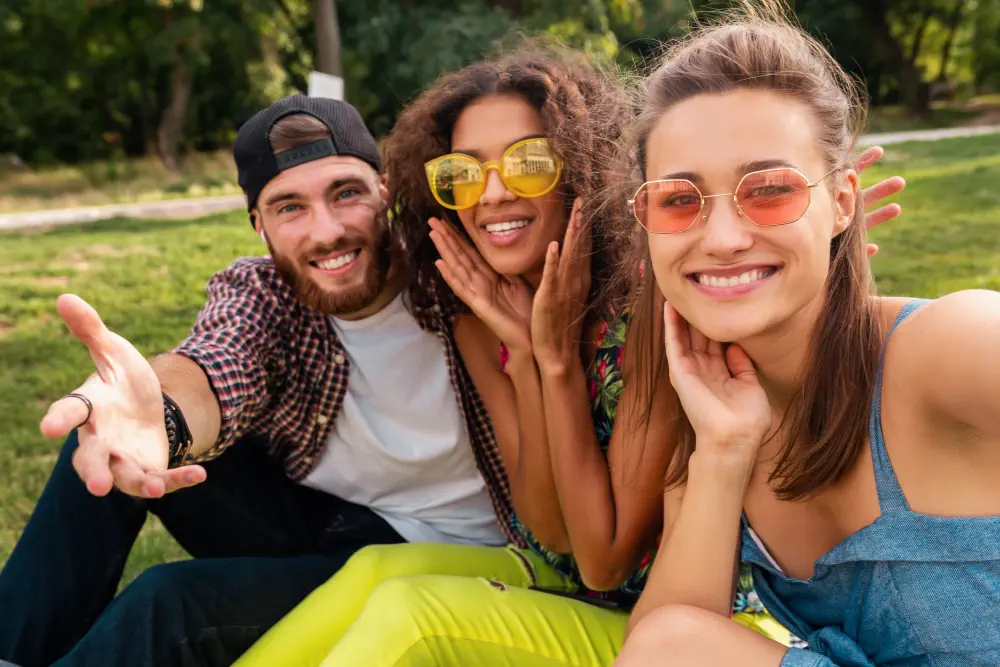 colorful-stylish-happy-young-company-friends-sitting-park-man-women-having-fun-together What Is Lean Drug?