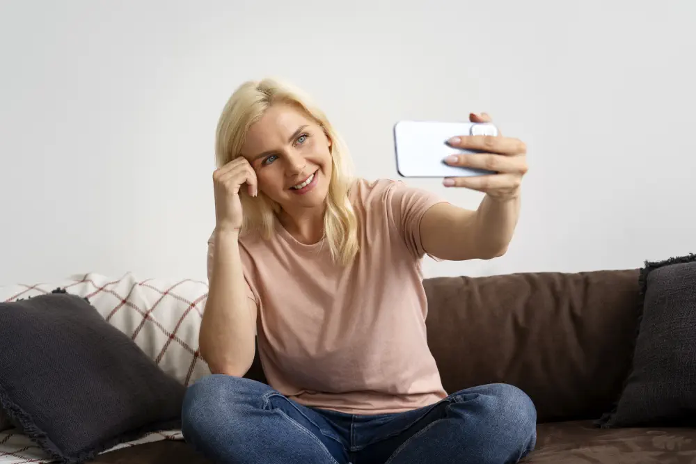 front-view-smiley-woman-taking-selfie The Impact of 30 Days of No Alcohol on Liver Health