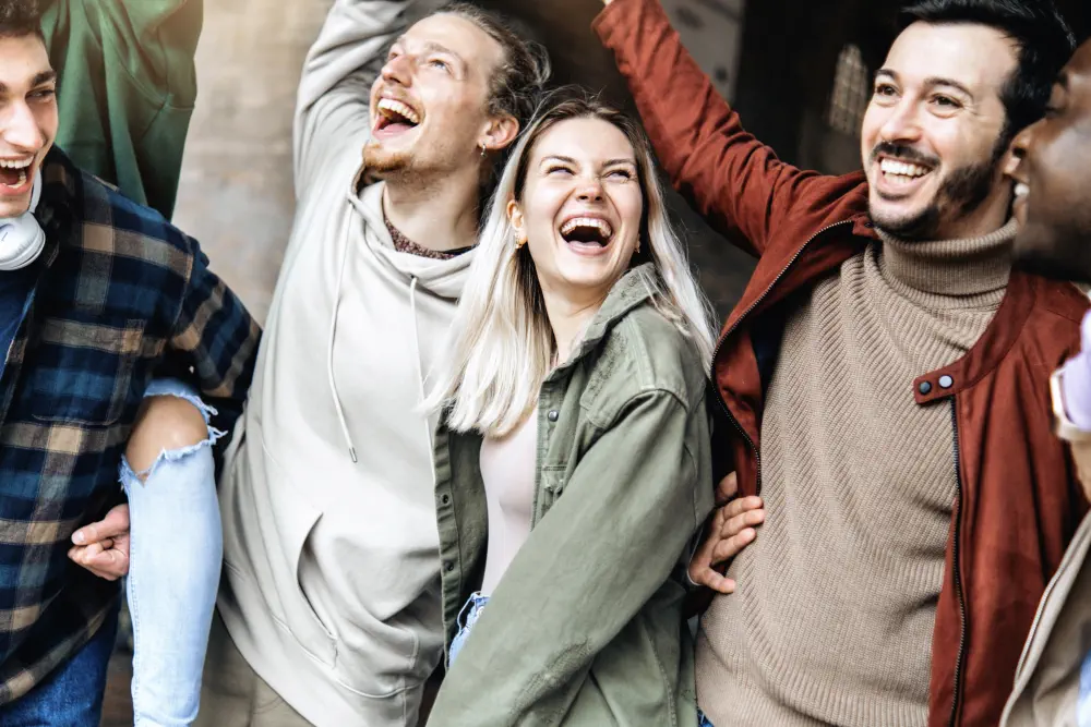 multiracial-young-people-laughing-celebrating-victory-event-outside How to Help an ADDICT in 5 Easy Steps