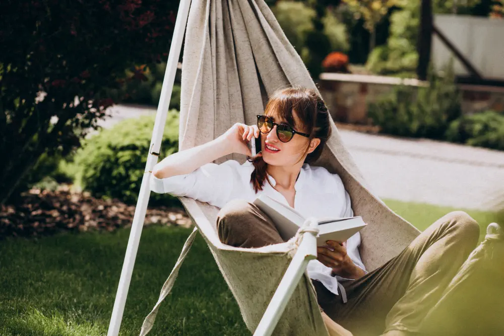 woman-reading-book-garden-by-house Is Marijuana Bad for Health?