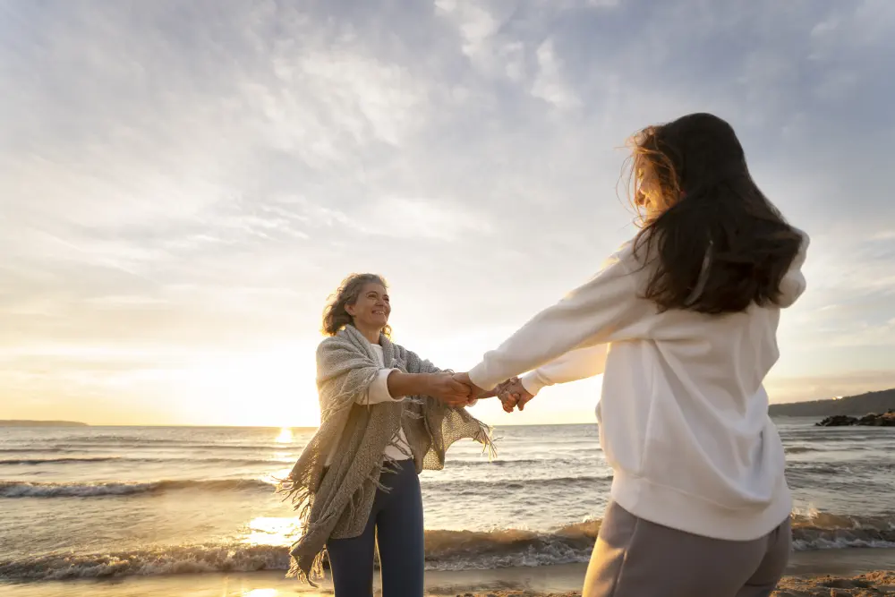 women-holding-hands-side-view Understanding Salvia Addiction: Risks, Symptoms, and Treatment
